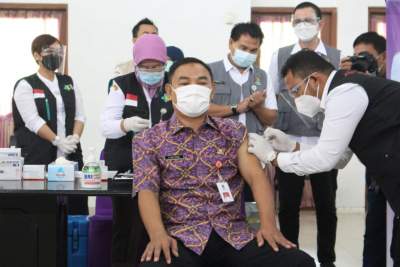 Pasca  Divaksin,  H Mad Romli Tetap Berpesan Prokes Wajib Dipatuhi