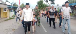 Wakil Bupati Serdang Bedagai, Adlin Umar Yusri Tambunan menintas jalan Desa Bogak Besar dengan aspal hotmix.