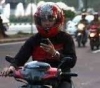 SMS-an Saat Berkendara Bisa Dibui