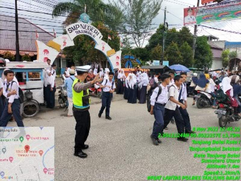Sat Lantas Polres Tanjung Balai Laksanakan Pengamanan dan Gatur Lalin Anak Pulang Sekolah