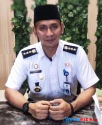 Gelar HUT ke 19, Camat Gunung Kaler Komitmen Dekatkan Pelayanan Kepada Warga