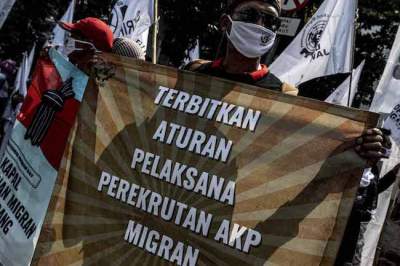 Ilustrasi aksi buruh menentang perlindungan pekerja migran.