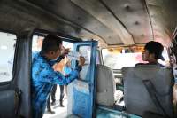 penempelan stiker tarif angkutan umum.