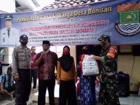 Desa Bonisari Salurkan Bantuan Paket Sembako dari Kemensos RI