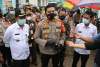 Polresta Tangerang Bareng TNI dan Pemkab Bagikan Masker di Cikupa