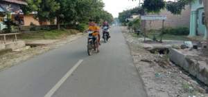 Jalan menuju Desa Panombean aspal hotmix.